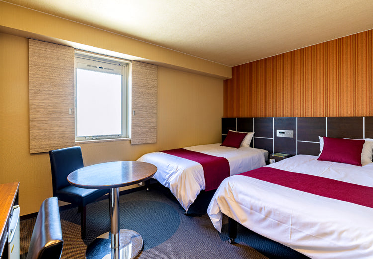 写真:カップル・ご夫婦、お友達同士でのご利用にも最適な広々としたツインルーム